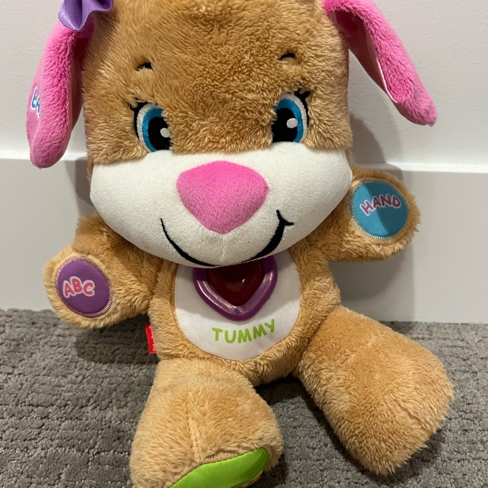 Fisher-Price Laugh & Learn Smart Stages Sis
Girl Puppy
Works —no batteries
